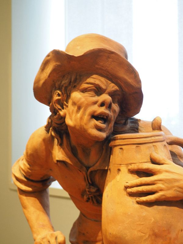 Interesting expression on this sculpture of a working man