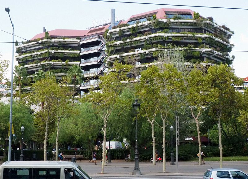 This building has lots of greenery hanging from it