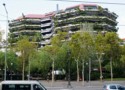 This building has lots of greenery hanging from it