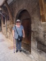 Linda next to a very old door