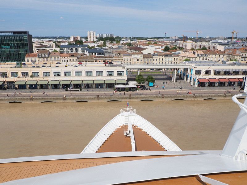 The ship spins around so it can back into the pier