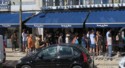 Line of people waiting to buy famous custard pastry