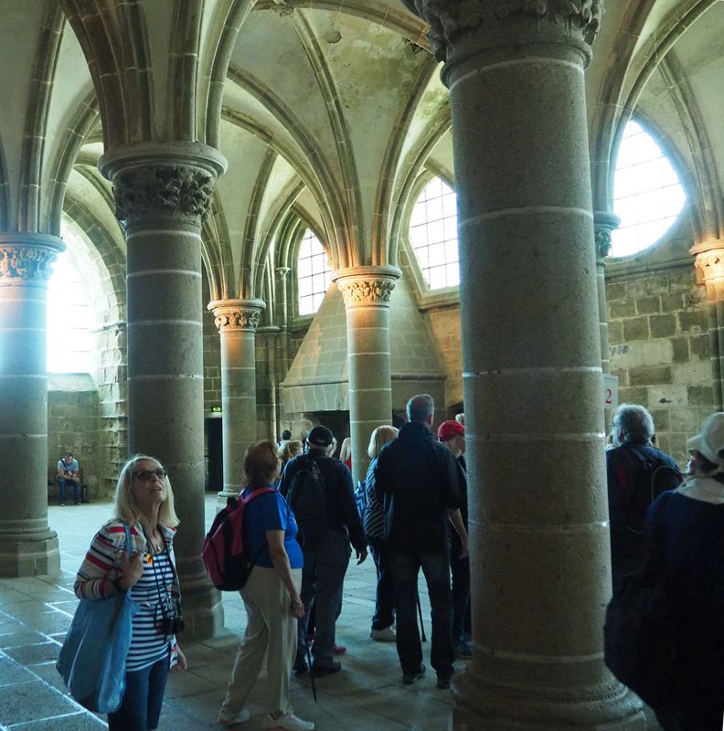 Eloise looks up at the arches in the Knight's Hall