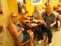 Eloise, June, and Linda eating crepes for lunch