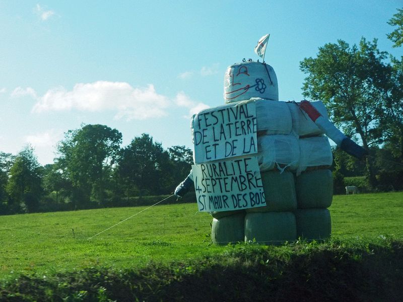 Festival sign made from bales of hay