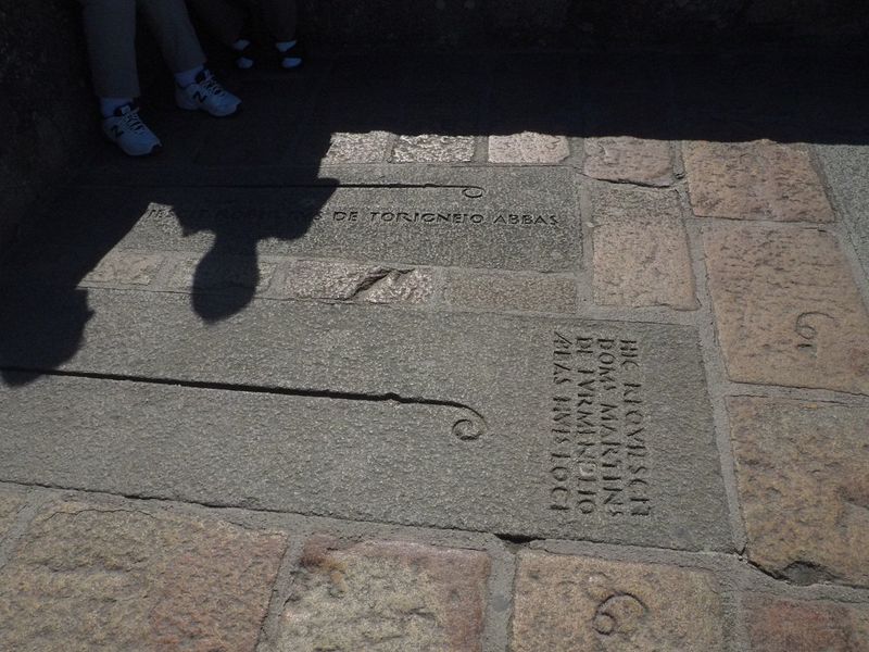 Graves embedded in the stone floor