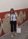 Our guide shows us millstones embedded in the wall