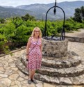 Eloise next to an old well