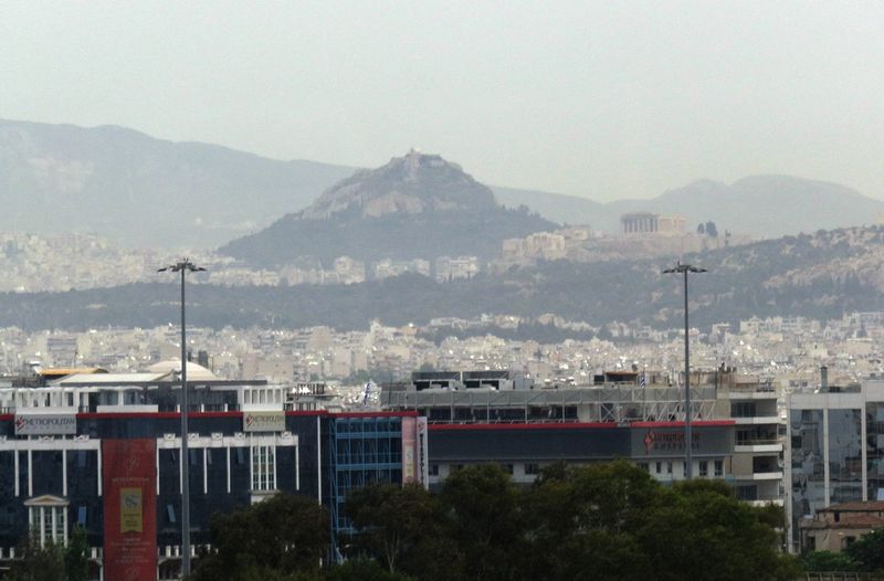 Mount Lycabettus and the Parthenon in the distance