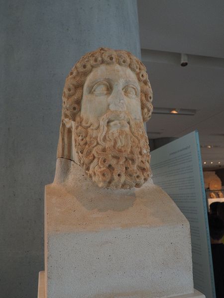 Greek sculpture with curly beard