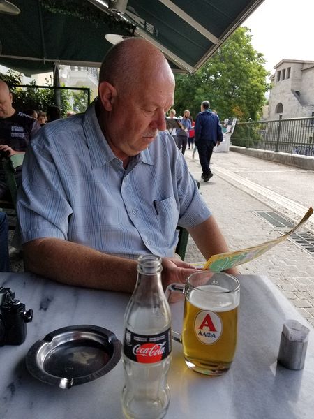 Pete has a beer and looks at our map