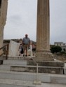 Pete next to a column