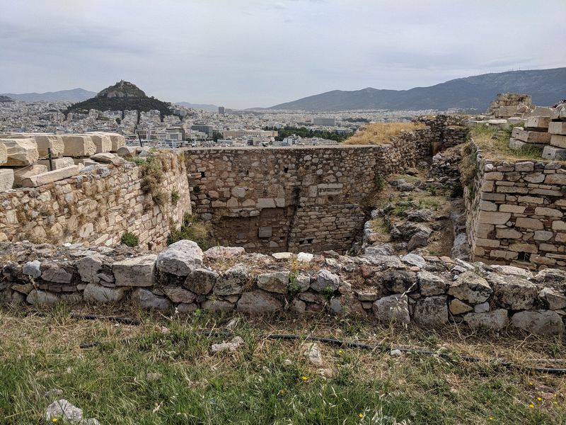 Old stone works and Lycobetus Hill in the distance