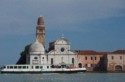 A vaporreto passes the Chiesa di San Michele in Isola