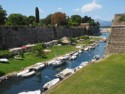 The fortress moat is full of small boats and fishing shacks