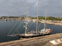 The sailing ship Running on Waves is docked next to us