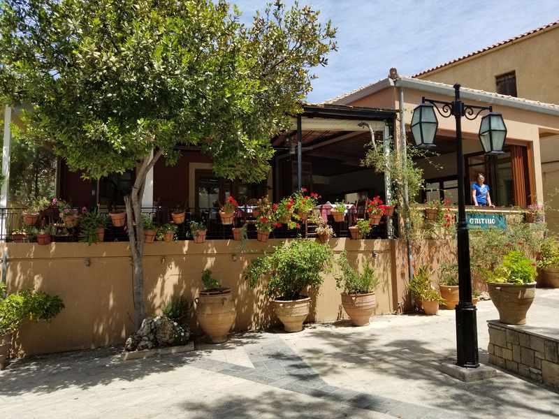 Lots of geraniums in pots on this restaurant