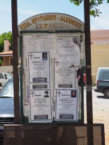 Obituaries posted at the bus stop