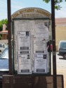 Obituaries posted at the bus stop