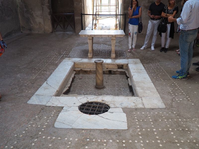 An indoor fountain made of marble