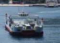 A ferry with lots of vehicles