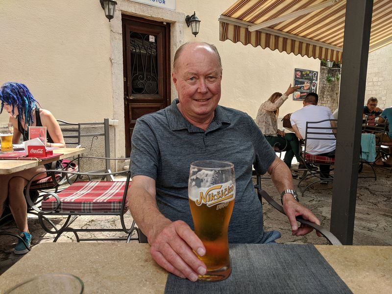 Livingston enjoys a local beer