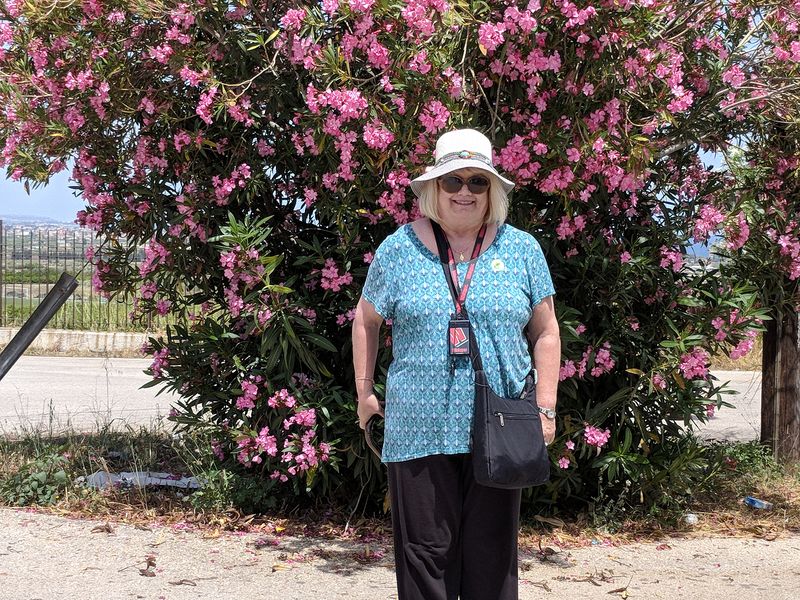 Linda next to an oleander