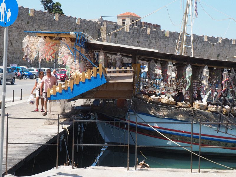 A boat selling shells and sponges