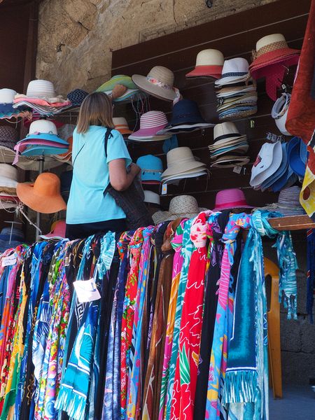 June is shopping for hats