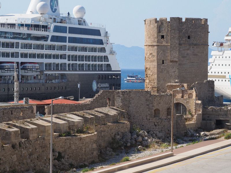 Ruins of a medieval tower next to the ships