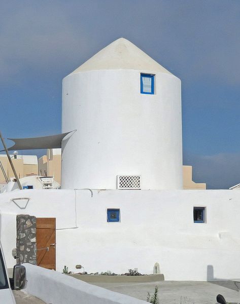 An old windmill has been converted into a round house