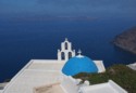 Blue dome and bell tower in Firostefani