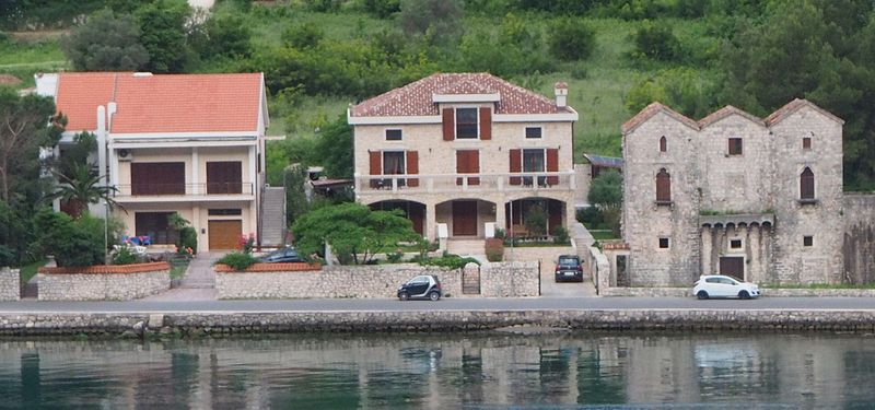 Smart Car in front of waterfront house in Montenegro