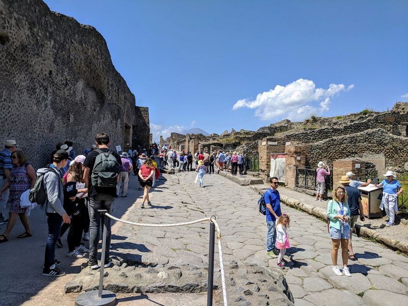 Lots of tourists on the streets of Pompeii