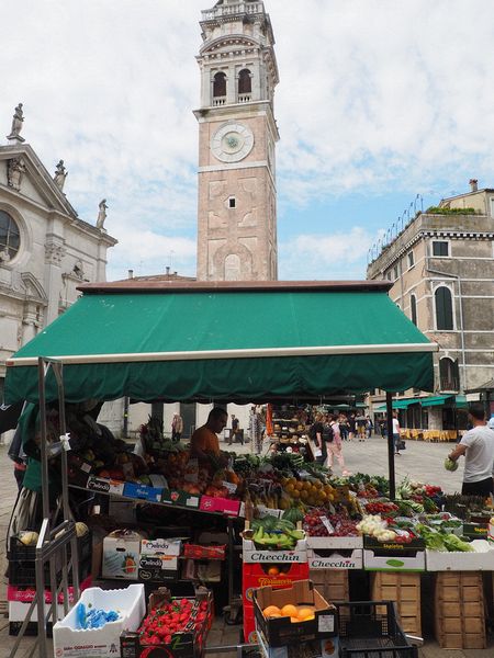 A fruit stand next to the Church of Santa Maria Formosa