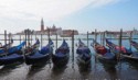 Gondolas docked in a row