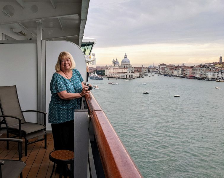 Linda watches from her balcony