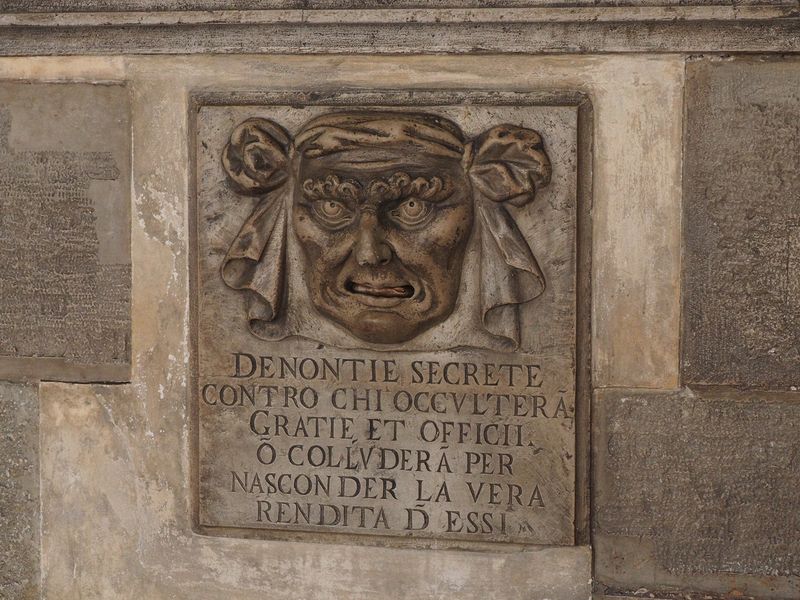 Something in Latin about secrets and the occult