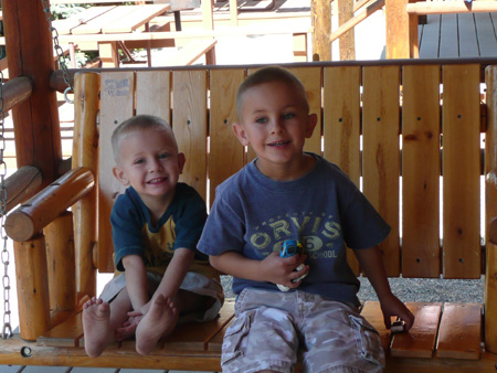 097 Andrew and Nicholas on porch swing