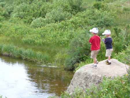 177 andrew and nicholas fishing on a rock