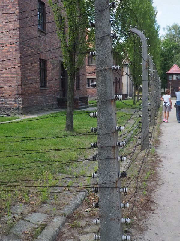 Electrified barbed wire around the women's section