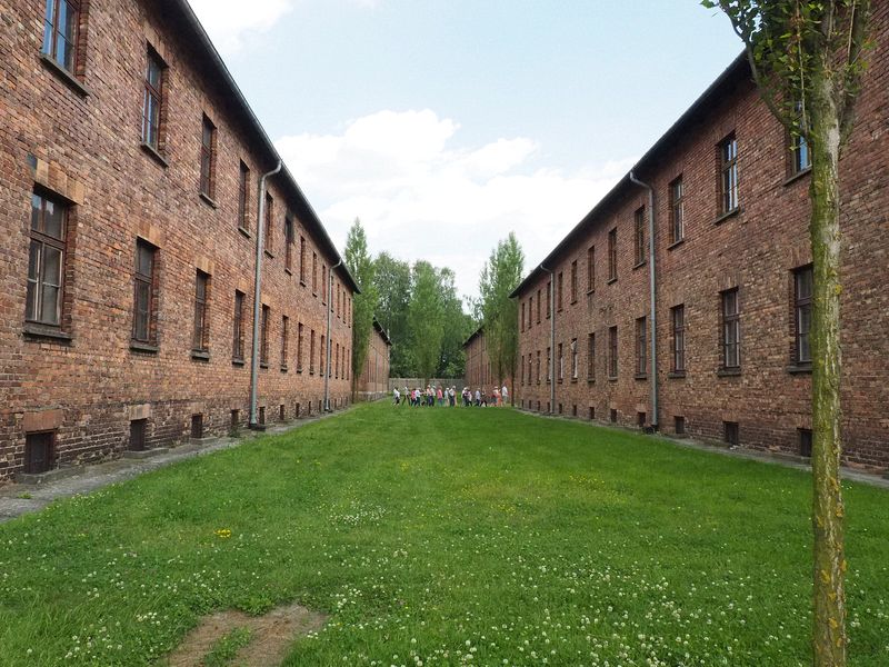 Tour group walking between cell blocks