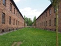 Tour group walking between cell blocks