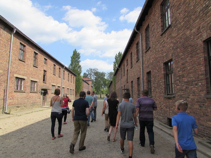 Walking amongst the buildings of the concentration camp