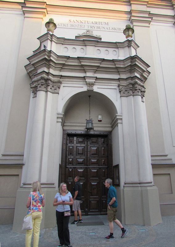 Robin, Diane, Dave, and Steve inspect a church door