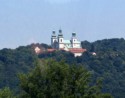 We pass a monastery in the hills