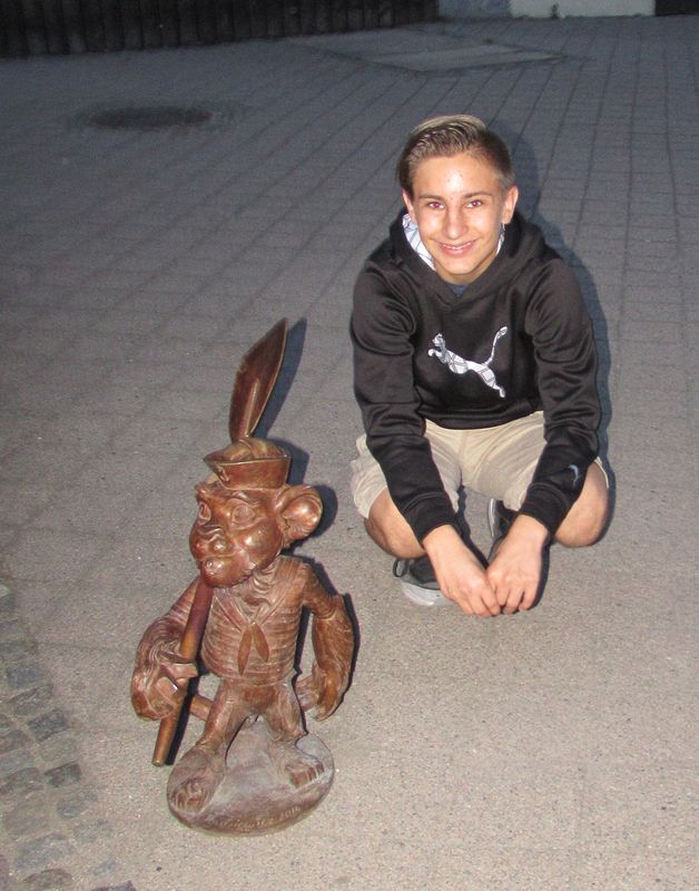 Andrew and a tiny sailor sculpture