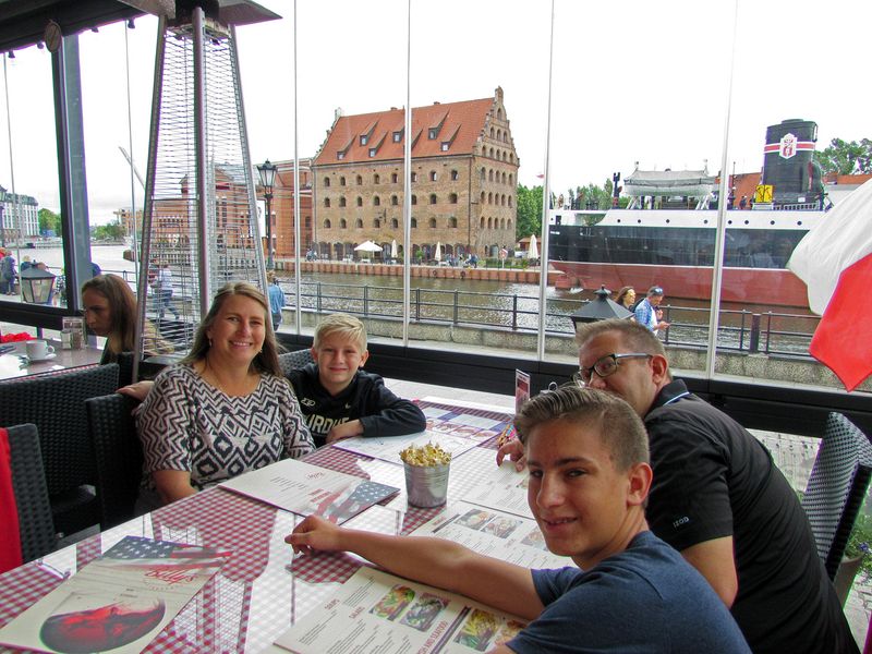 Jen, Nicholas, Andrew, and Dave at a restaurant across the river from our hotel