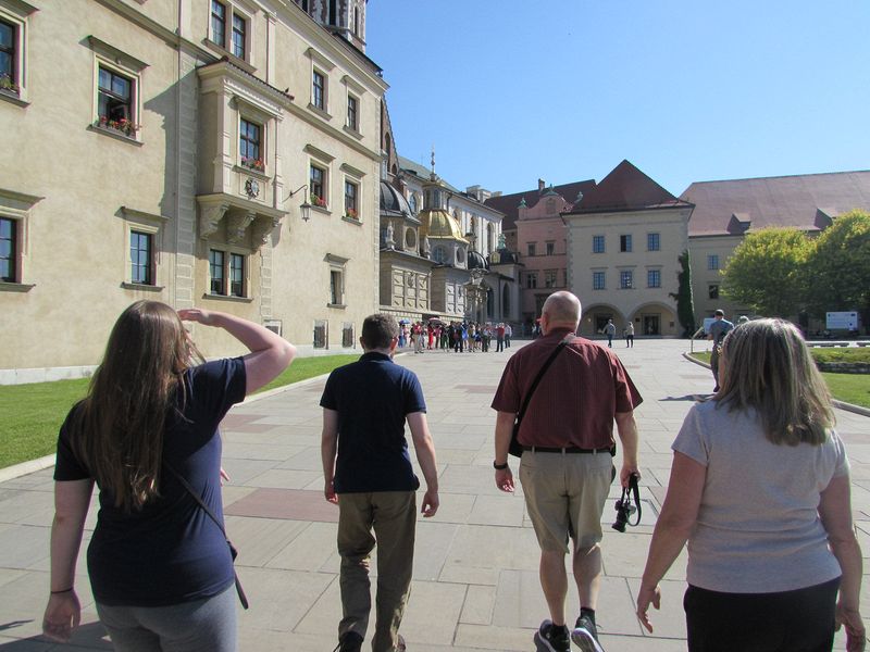 Amanda, Ehren, Pete, and Diane walking to Wawel Castle