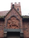 Statue of a Teutonic Knight covered in bird netting